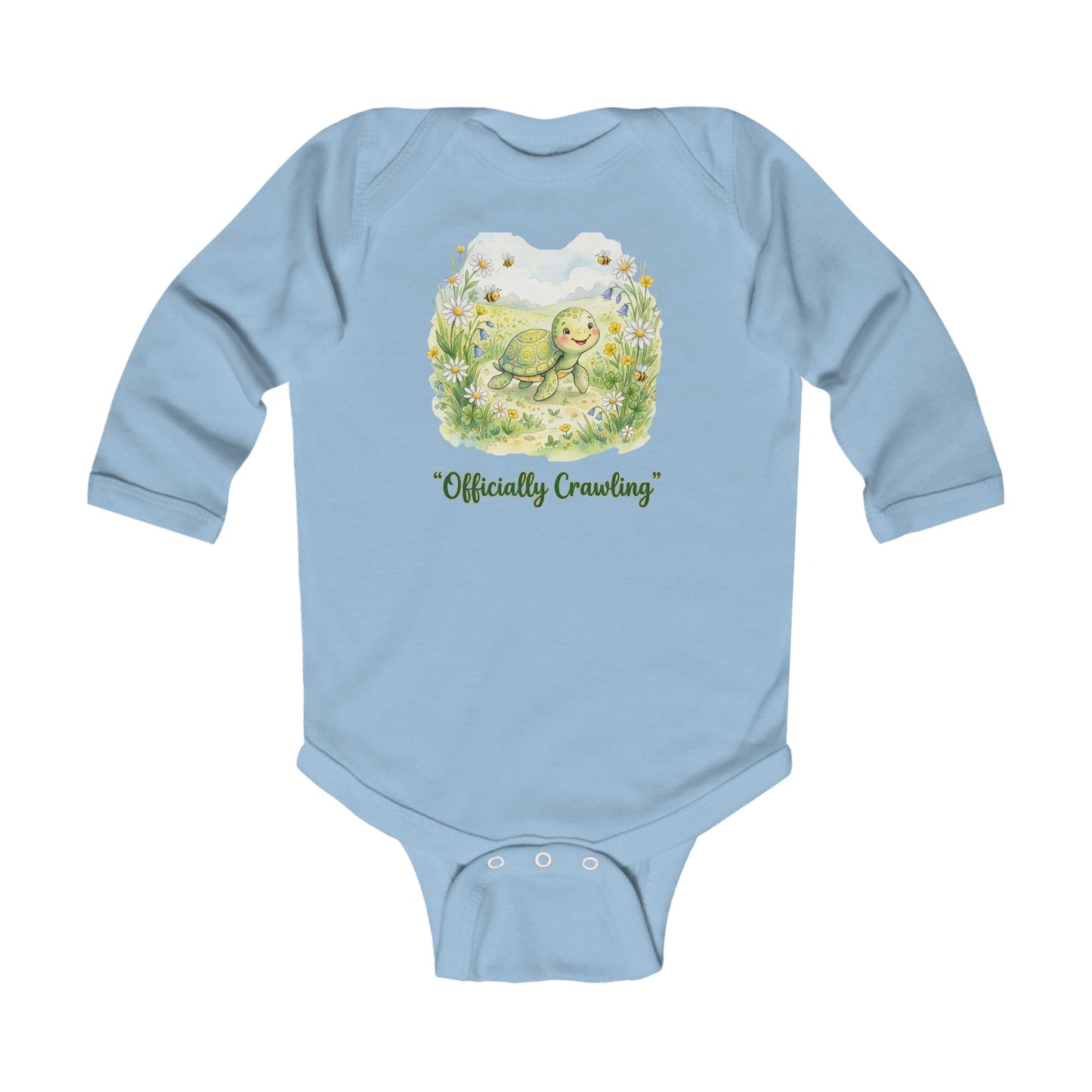 Light blue baby onesie with a turtle graphic and 'Officially Crawling' text on a white background