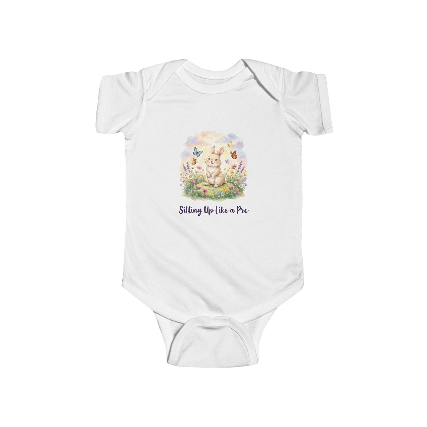 White baby onesie with a printed design of a bunny and text on a white background